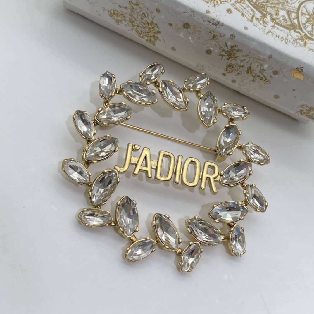 7 Star Chr1st1an D10r Brooch