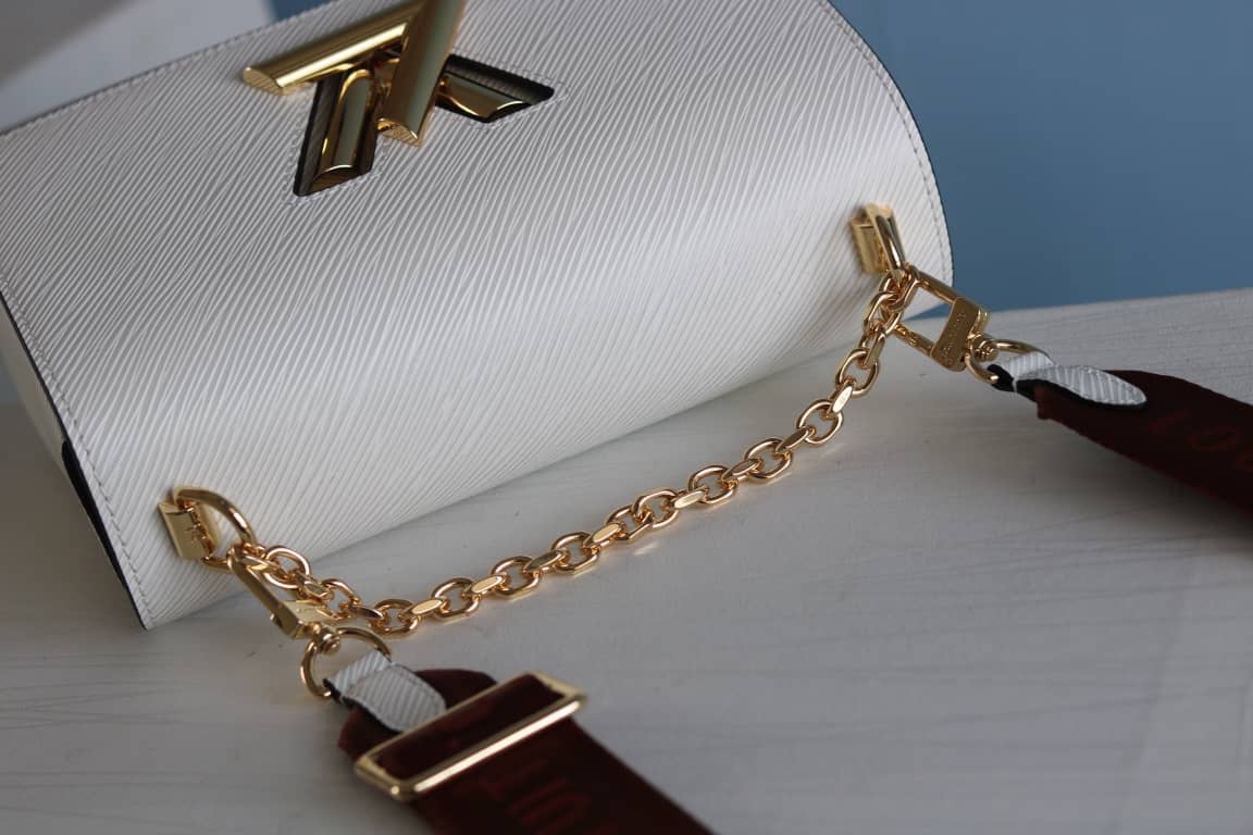 L0vis Vvtt0n Textured Epi Leather Twist Series Bag