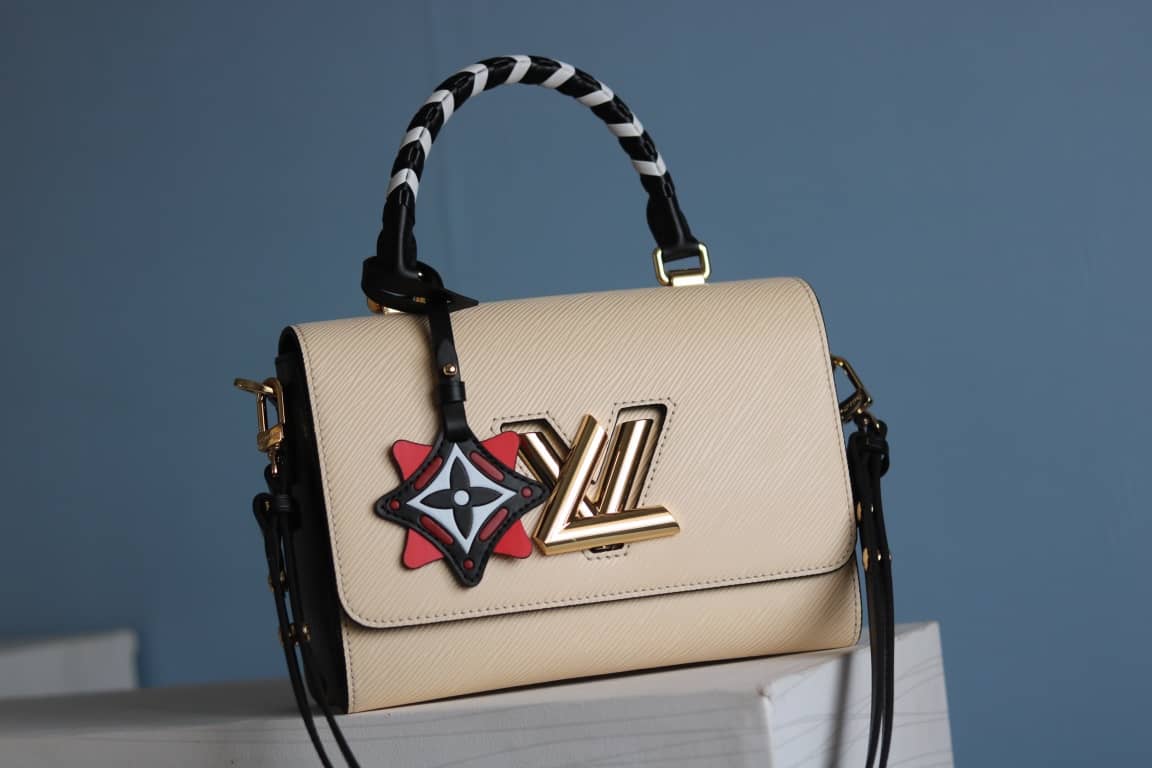 L0vis Vvtt0n Textured Epi Leather Twist Series Bag Beige