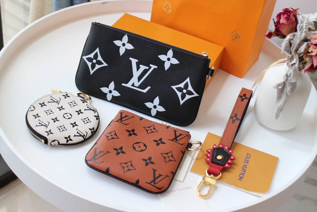 L0vis Vvtt0n Crafty Trio Pouch Monogram Empreinte Replica M69516