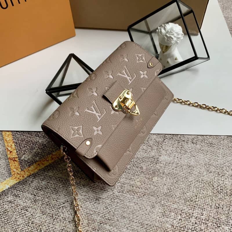L0vis Vvtt0n Monogram Empreinte Vavin Chain Long Wallet Replica Apricot M67839