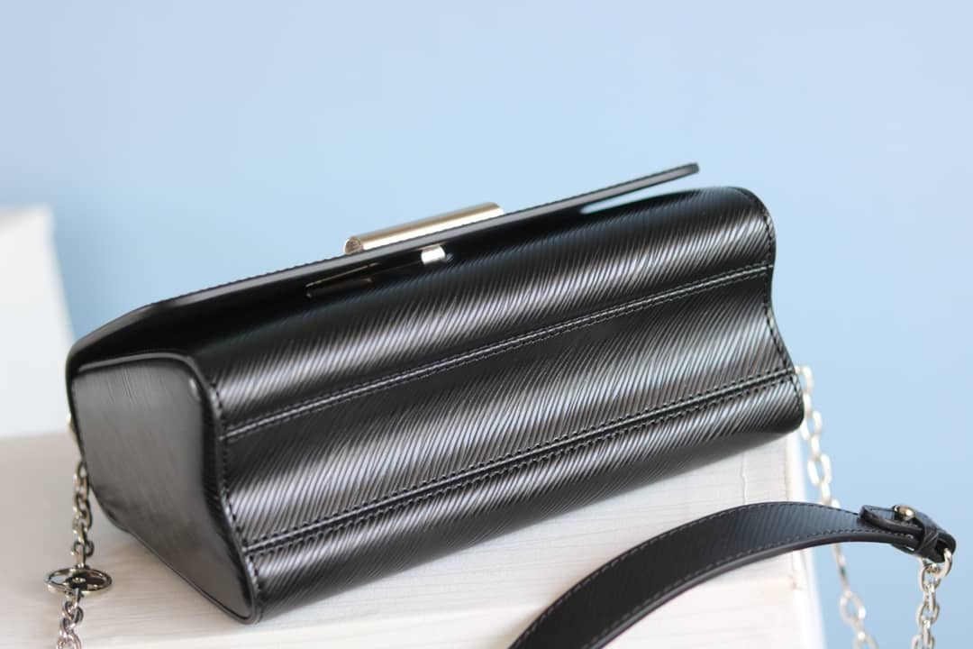 L0vis Vvtt0n Textured Epi Leather Twist Series Bag