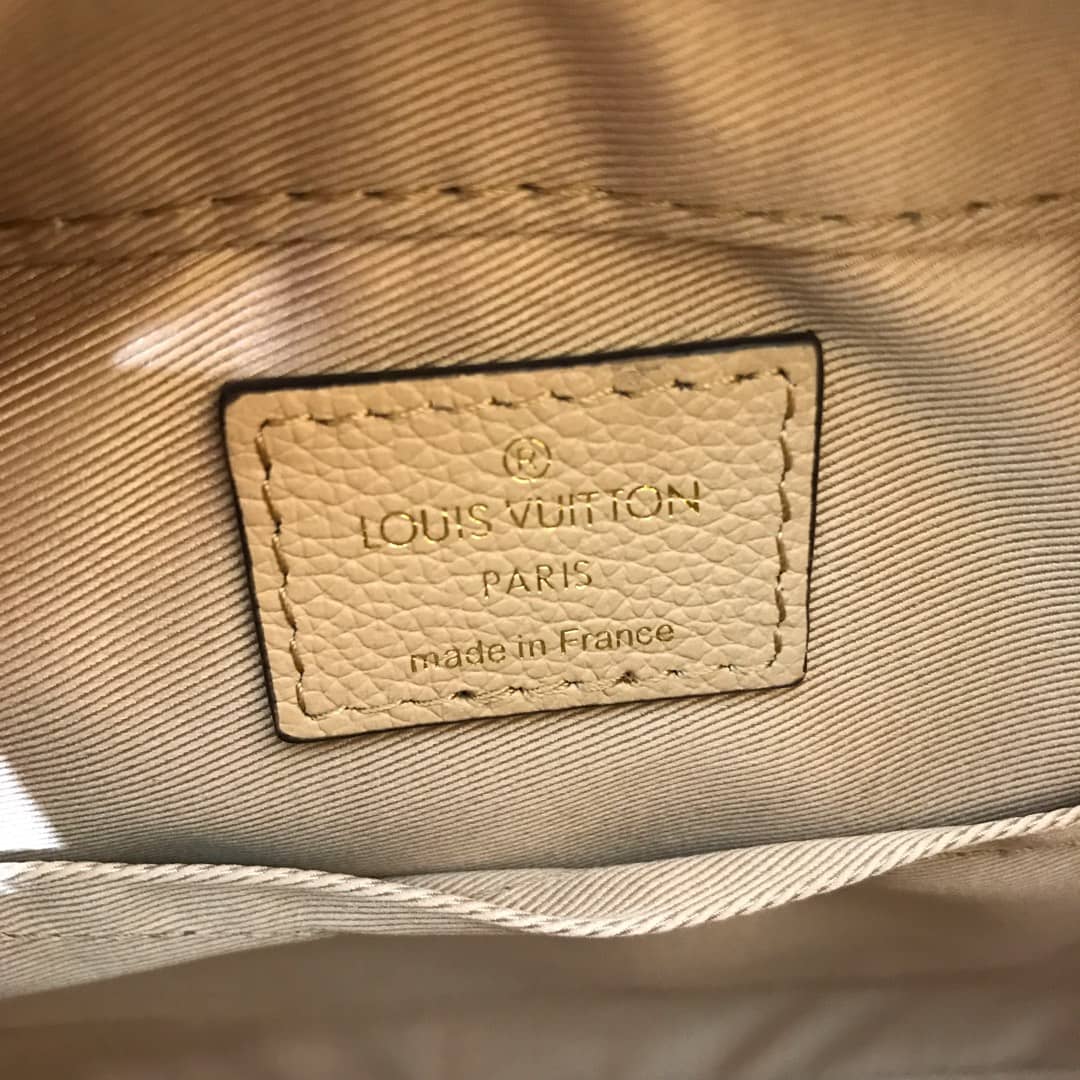 L0vis Vvtt0n Monogram Empreinte Saintonge Replica Bag Beige M44606