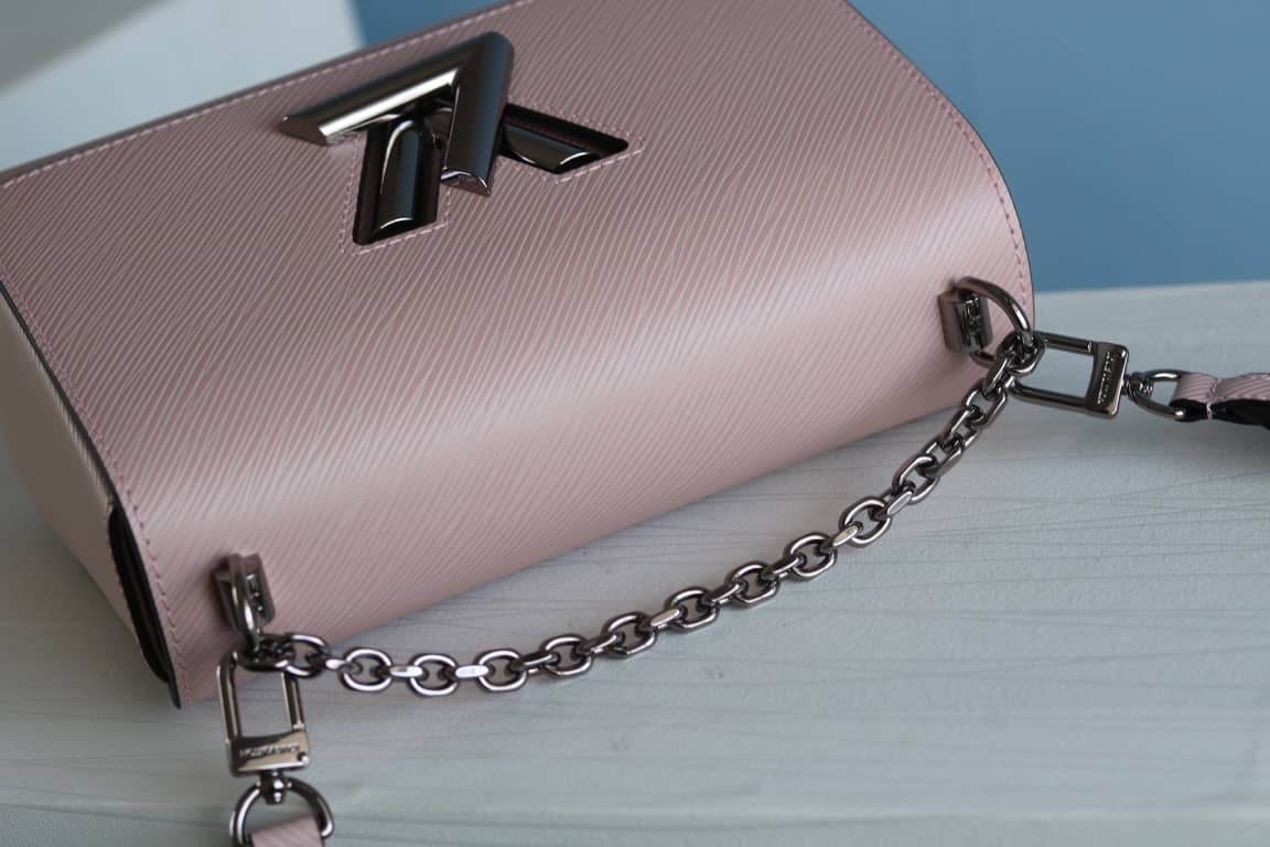 L0vis Vvtt0n Textured Epi Leather Twist Series Bag