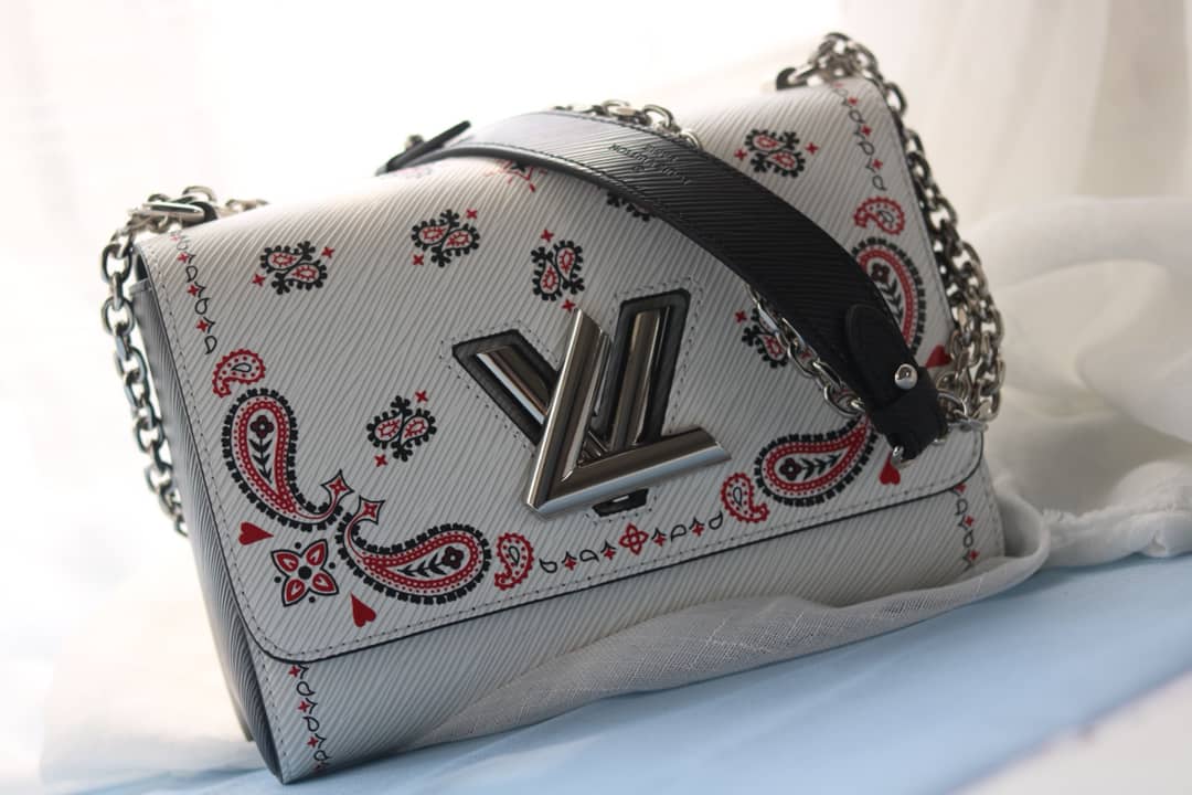 L0vis Vvtt0n Textured Epi Leather Twist Series Bag White