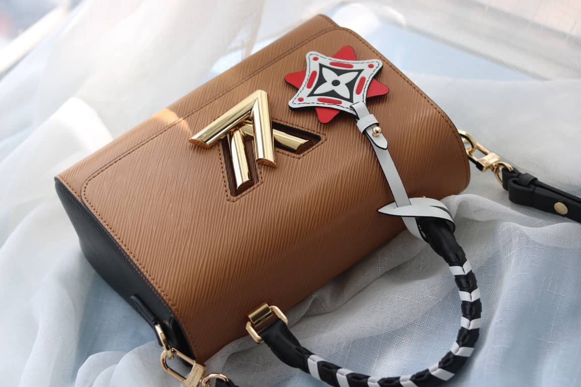 L0vis Vvtt0n Textured Epi Leather Twist Series Bag Brown