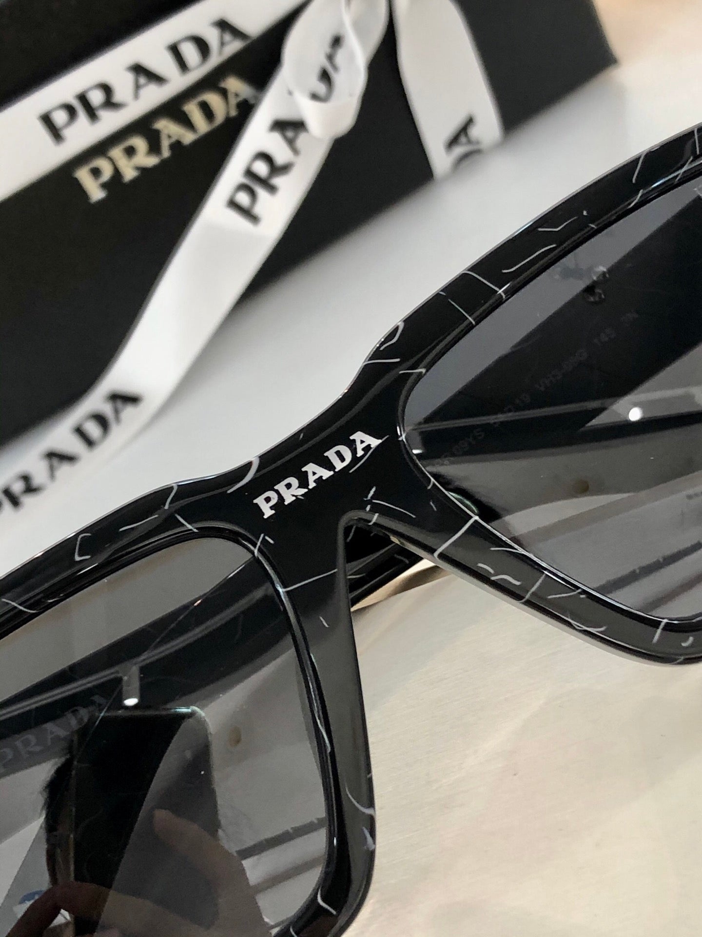 Pra*a Sunglasses